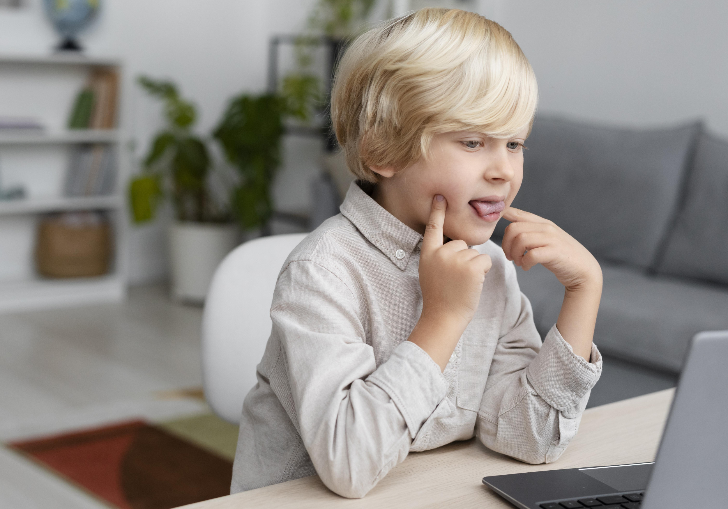 5 adorable-little-boy-doing-online-session-speech-therapy.jpg