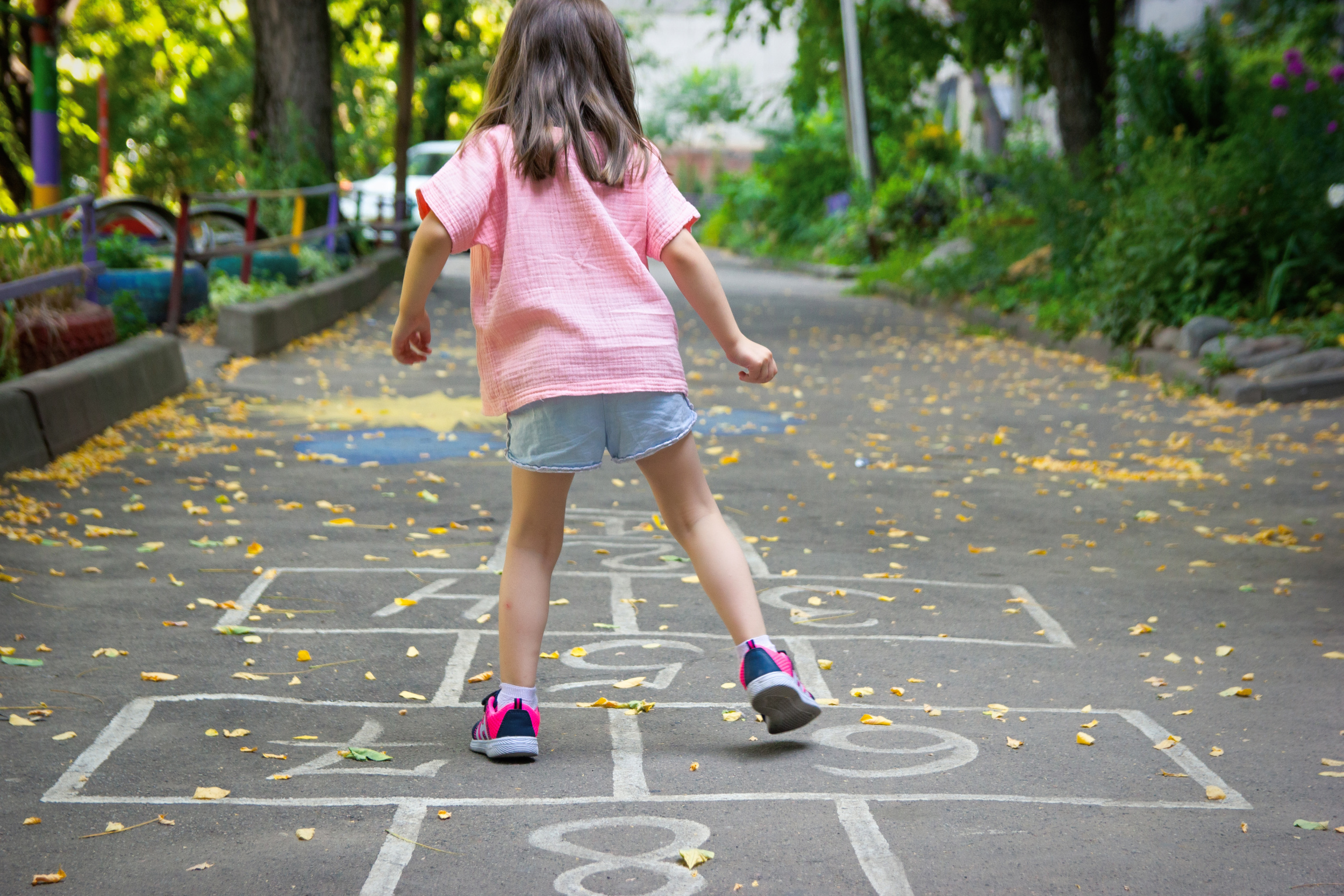 1 little-cute-girl-5-yo-playing-hopscotch-playground-outdoors-selective-soft-focus.jpg