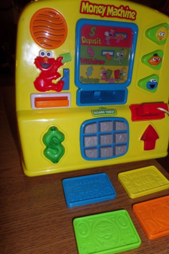 Музыкальная игрушка Sesame Street Talking ATM Money Machine Elmo